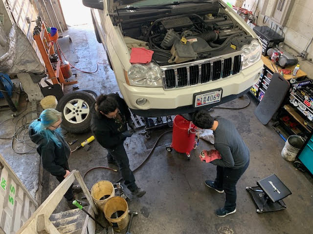 Our team of mechanics working on a car